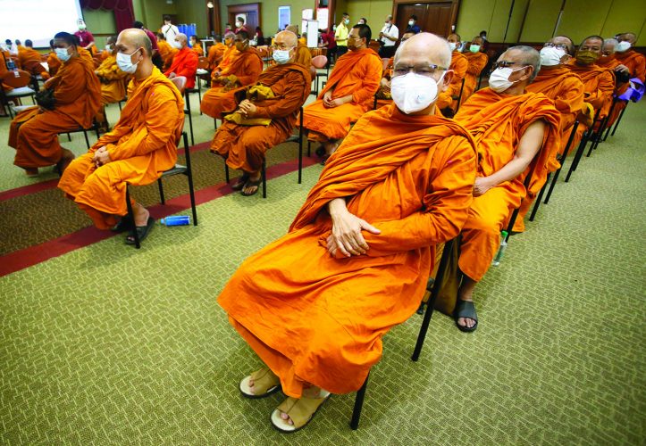 Restrictions reimposed as virus resurges in much of Asia